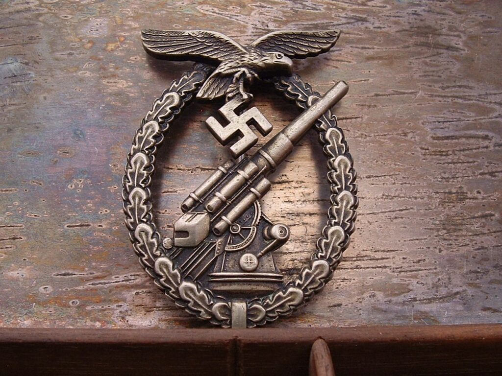 1 - Early Tombac Flak Badge by Assmann - A540